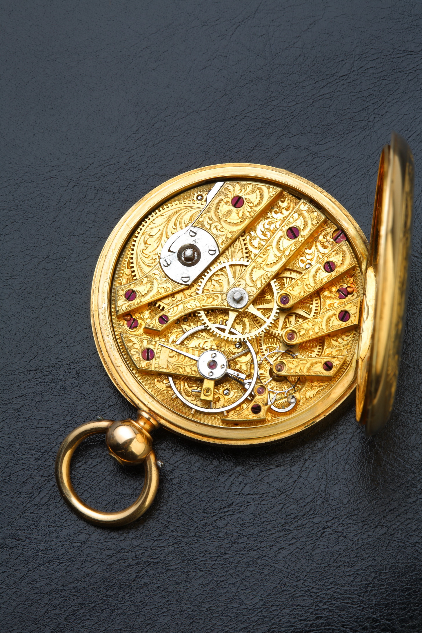 Золотой гравированный механизм часов H.Moser&Cie